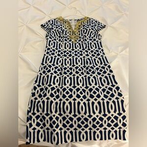 Navy and white dress with gold embellishment